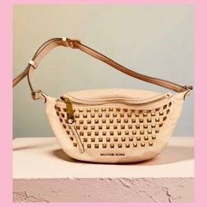 Michael Kors Light PinkLeather Studded fanny pack Bag with Gold Hardware.
